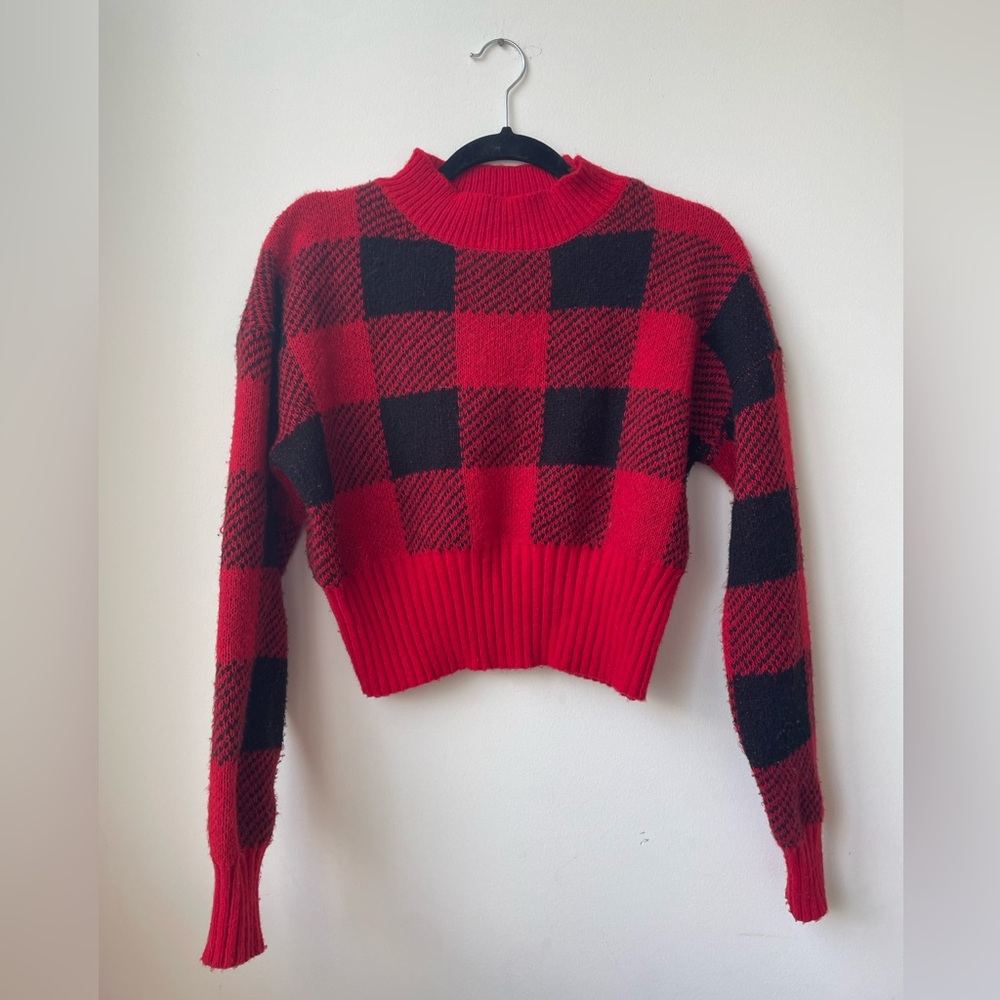 Red and black checkered sweater